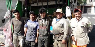 A Mexico City garbage truck crew.