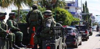 The first mobilization of the National Guard appears in Chiapas, though dressed in police and military uniforms.