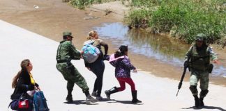 Soldiers nab migrants attempting to cross the northern border into the US.