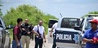 Chief fires a rifle into the air in Coahuila.
