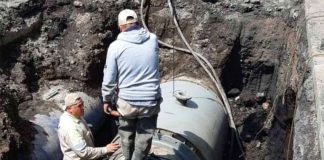 Sacmex staff work on a city water line.