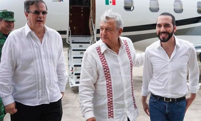 Ebrard, left, and López Obrador greet El Salvador's Bukele yesterday in Chiapas.