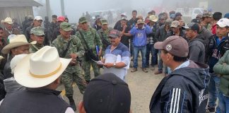 Soldiers and police have been held captive by farmers in Guerrero since Friday.