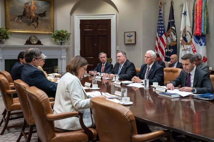 Mexican and US officials at the table yesterday in Washington.