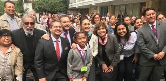 A student models the new 'neutral uniform' at a Mexico City ceremony today.
