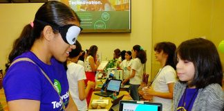 A blindfolded visitor gives Be My Eyes a practical test. The app was developed to help the blind get around.