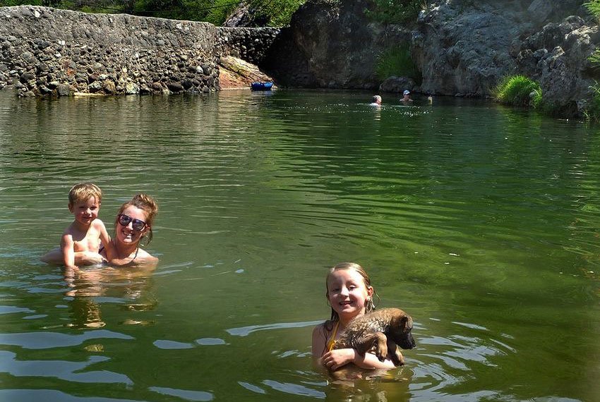 This pool, “at perfect bathing temperature,” is heated by several hot springs.