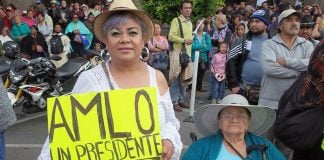 'A president made in Mexico,' reads a fan's sign.
