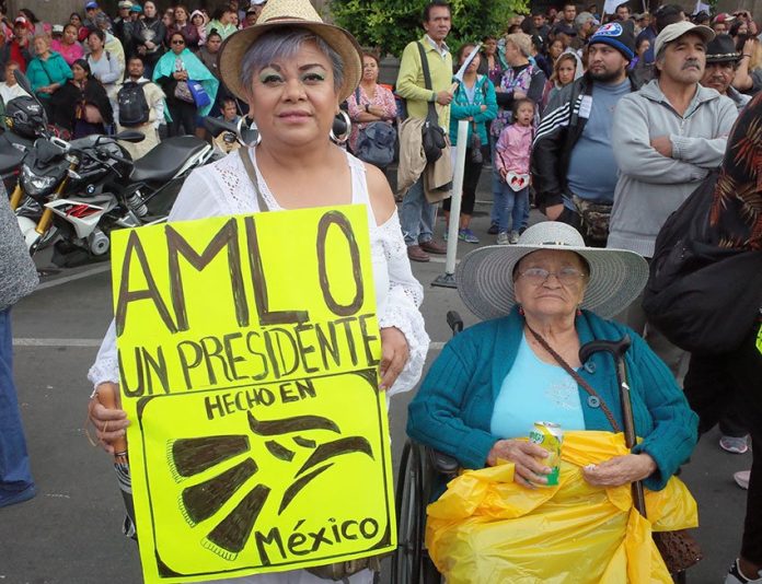 'A president made in Mexico,' reads a fan's sign.