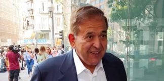 Steel company CEO Ancira speaks to reporters after his court appearance.