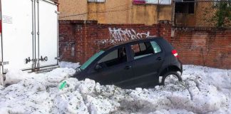 About 60 vehicles were damaged in Sunday's storm.