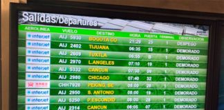 Departures screen at the Mexico City airport reveals Interjet's late (demorado) flights.