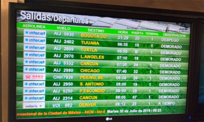 Departures screen at the Mexico City airport reveals Interjet's late (demorado) flights.