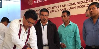 No peace in the valley: community representatives sign an accord that didn't last long.