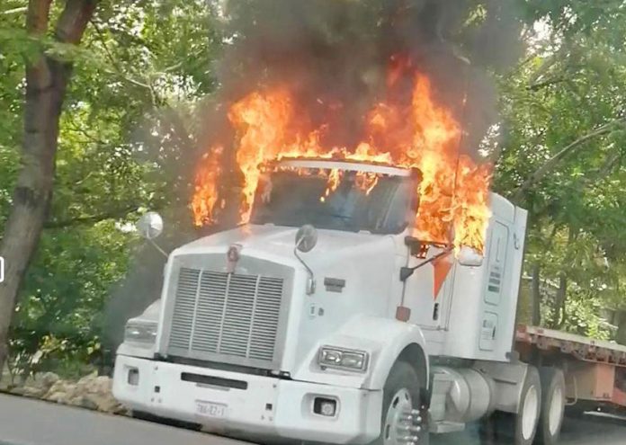 A semi-tractor burns at Chiapas roadblock.