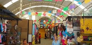 Vendors at the artisans' market are among those forced to pay extortion.