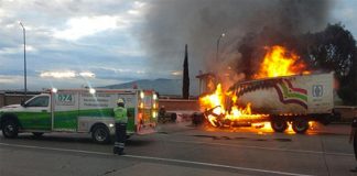 Firefighters at the scene of yesterday's toll plaza accident.