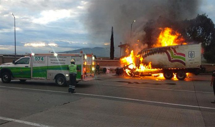 Firefighters at the scene of yesterday's toll plaza accident.