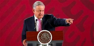 The president told reporters he was happy and relaxed despite injunctions against new airport.