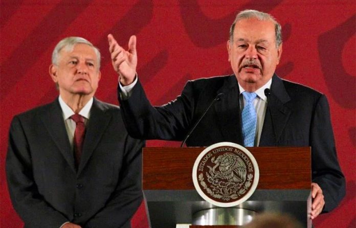 Carlos Slim speaks about the pipeline agreement during Tuesday's presidential press conference.
