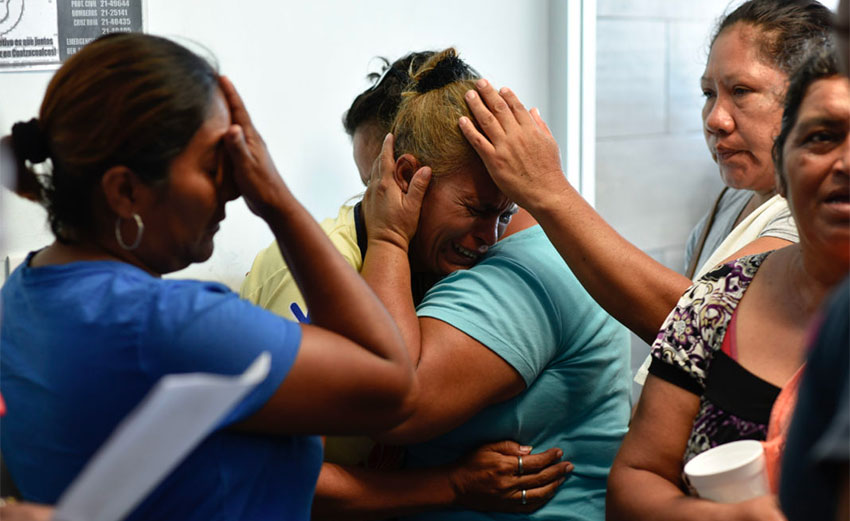 Friends and relatives of victims share their grief after Tuesday's assault on Veracruz bar.