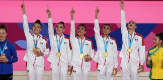The women's rhythmic gymnastics team with their second gold medal.