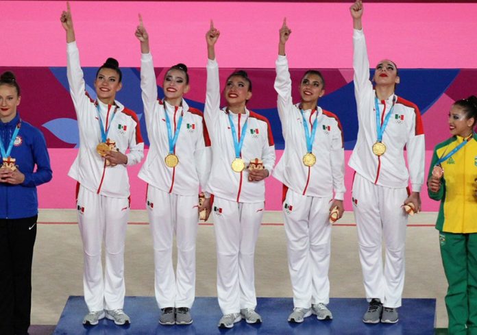 The women's rhythmic gymnastics team with their second gold medal.