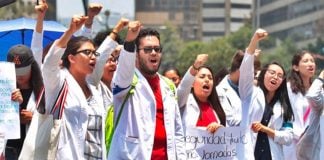 Interns march in Mexico City today.