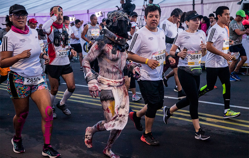 A runner sports an elaborate costume in last year's marathon.