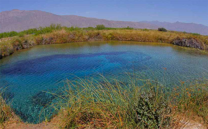 Poza la Becerra, where swimming and camping are allowed.