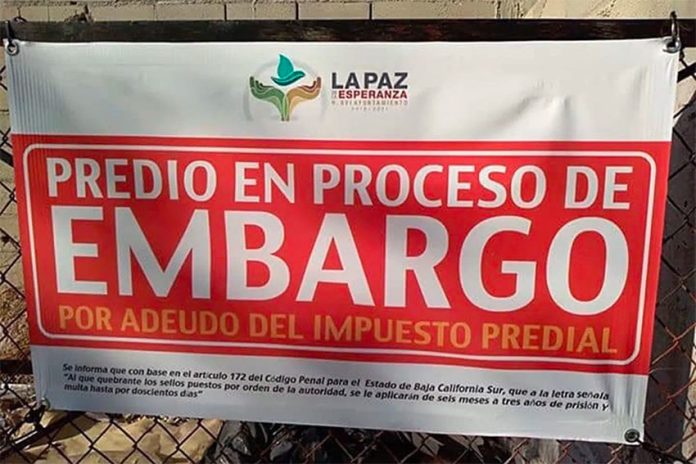 'This property is in the process of being seized,' reads a sign posted by La Paz authorities.