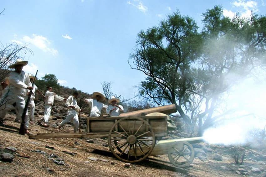 Reenactment of the battle shows Indians wearing white as required by law.