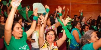 Supporters of abortion law cheer yesterday in Oaxaca.