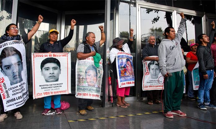 Parents of the missing students and supporters at a demonstration in Mexico City.