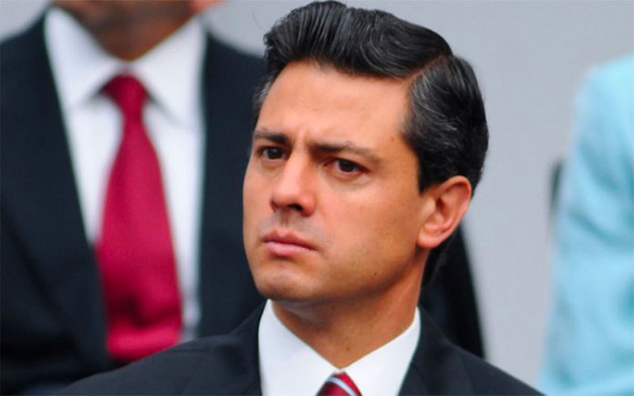 Not a strand of Peña Nieto's hair is out of place, thanks to all that gel.