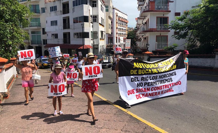 People protest the Horcones dam at a march in downtown Puerto Vallarta on August 25. 