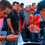 Federal Police arrest Iguala municipal police in 2014.