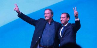 Fox, left, and Cortés at the National Action Party assembly.