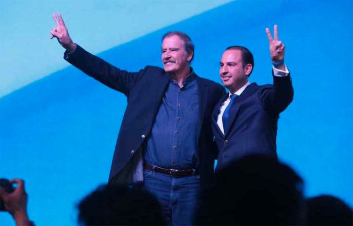 Fox, left, and Cortés at the National Action Party assembly.