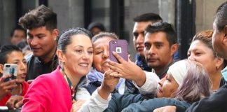 The mayor poses for selfies with fans yesterday in Mexico City.