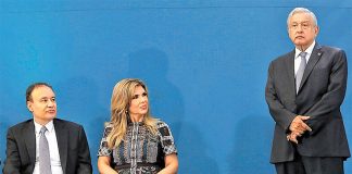 Durazo, Sonora Governor Claudia Pavlovich and López Obrador listen while the chief of the army speaks at Monday's press conference.