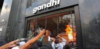 Vandals attack bookstore Thursday in Mexico City.