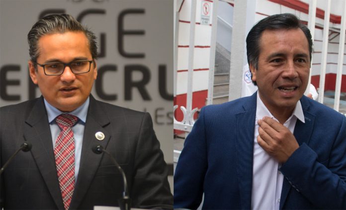 Suspended attorney general Winckler, left, and Governor García: no love lost.