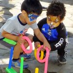 Kids playing games organized by Nike.