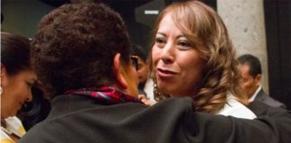 González, right, and Attorney General Godoy.