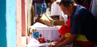 Cleaning up the family bones in Pomuch, Campeche.