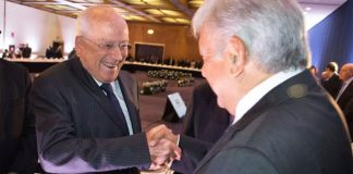 González, left, is all smiles with López Obrador but the two are not close.