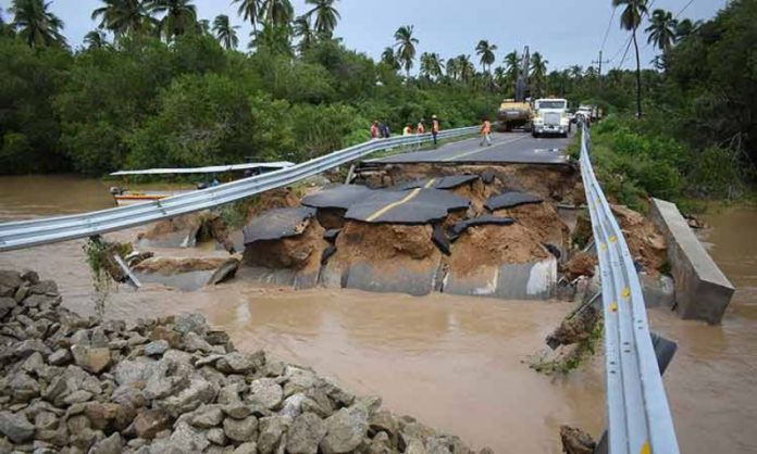 Washed-out bridges and mudslides cut off many communities in Guerrero.