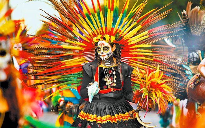 Elaborate costumes are a feature of the Mexico City parade.