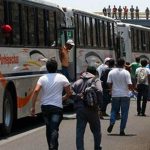 Students 'take' the bus.